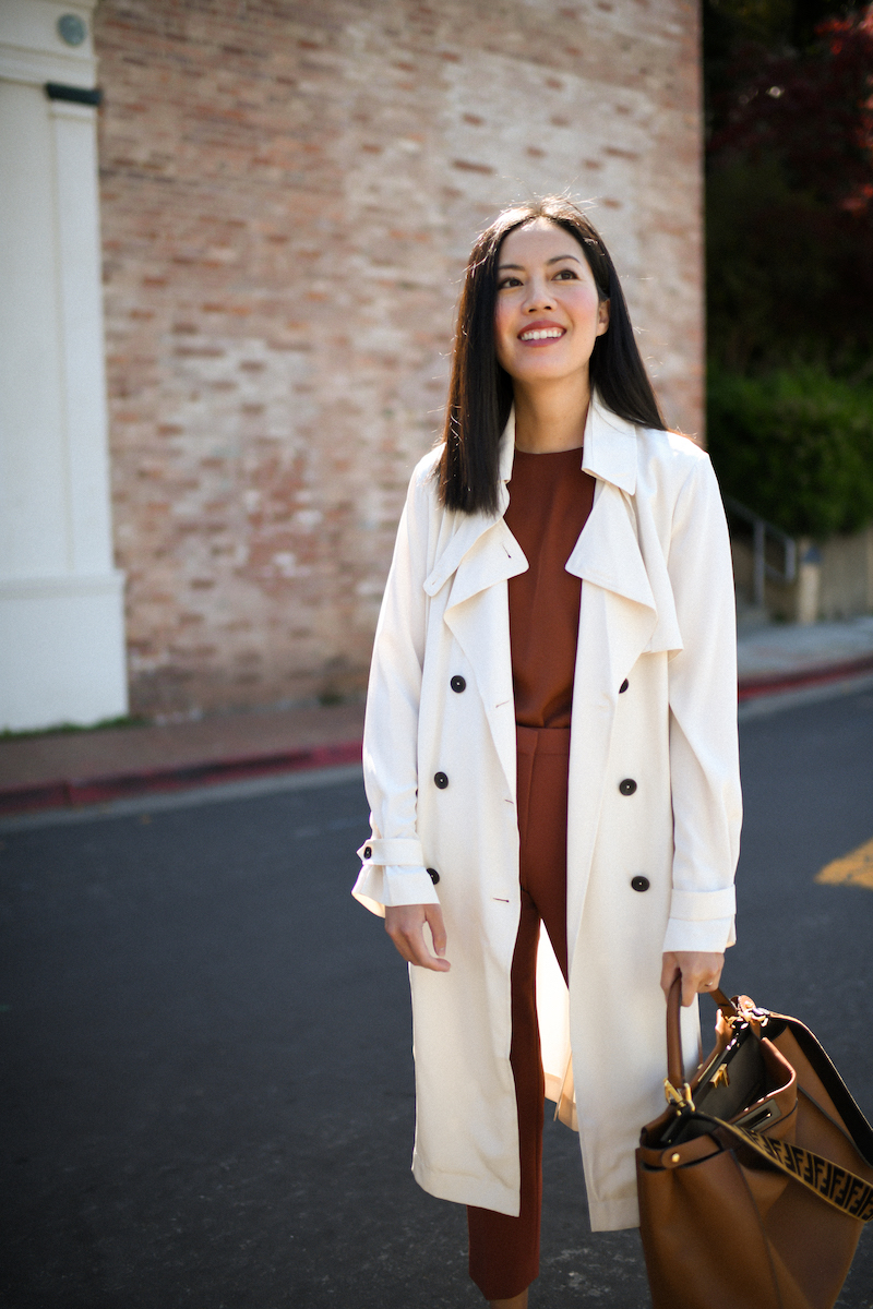 Beige silk trench, terracotta silk top and trousers